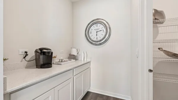 a kitchen with a stove and a microwave