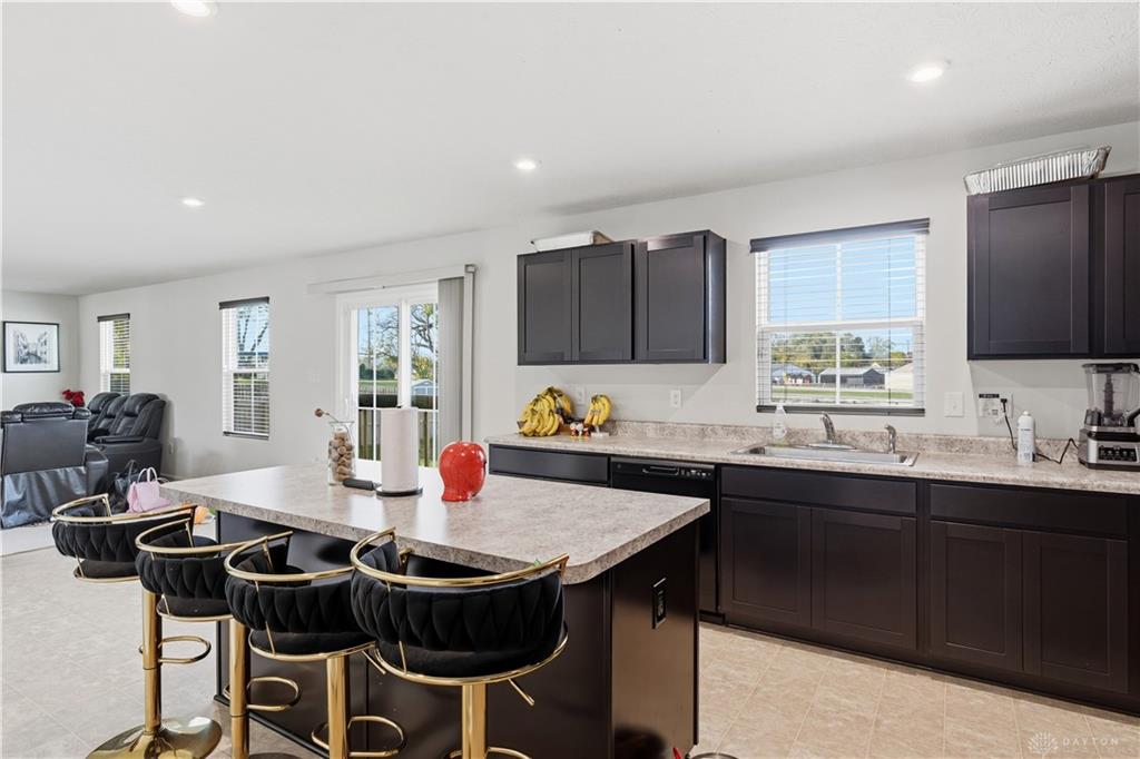 166 Chesapeake Circle Springfield, OH 45505 - Photo 7 of 15 Bright and open, this modern kitchen features ample counter space and convenient island seating.