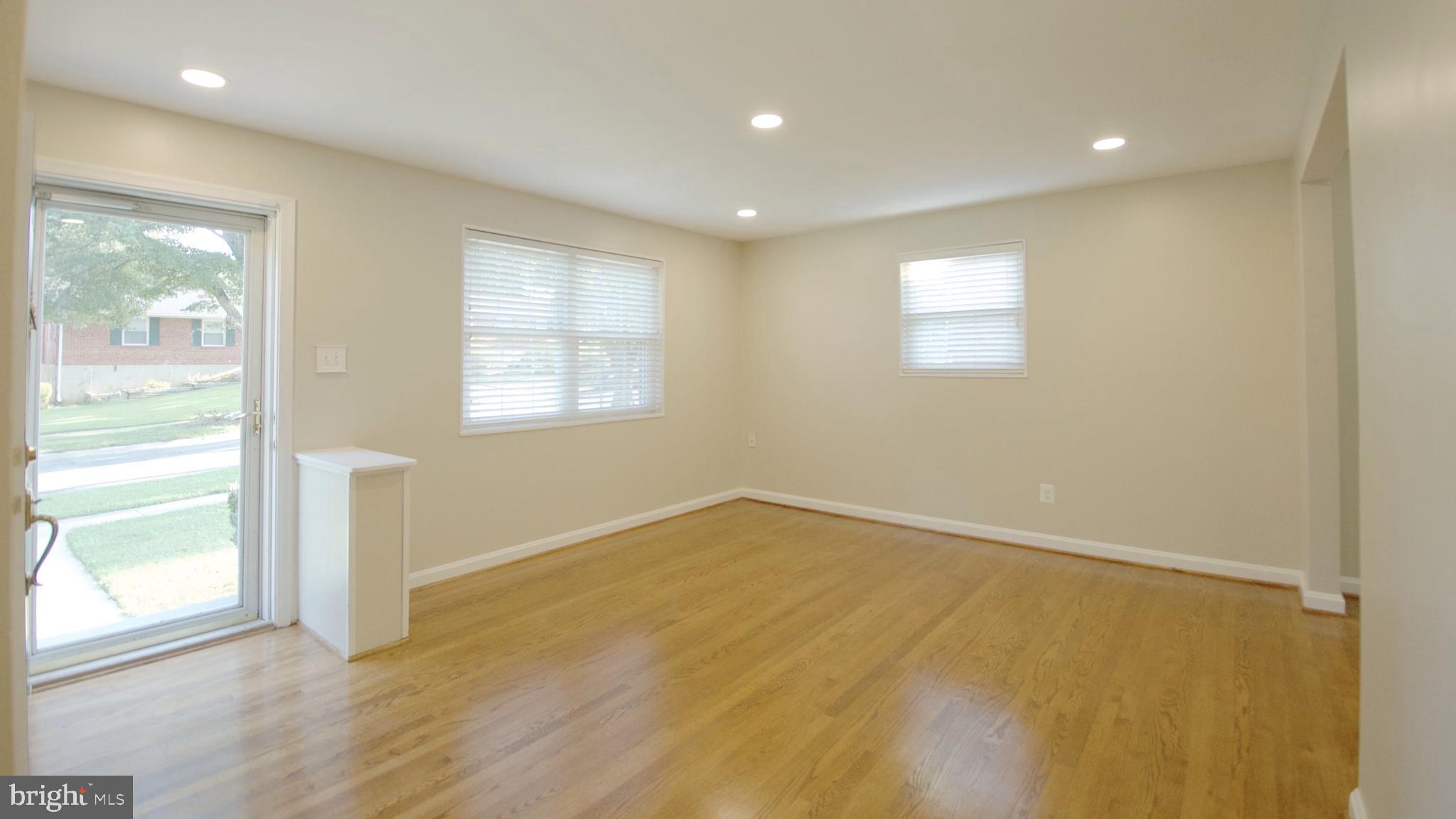 4715 Oxbow Road Rockville, MD 20852 - Photo 2 of 36 Living Room Front Door
