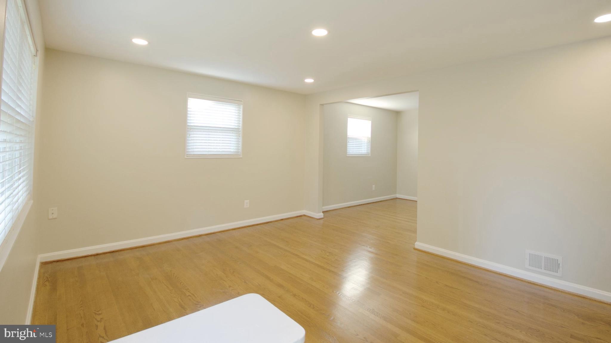 4715 Oxbow Road Rockville, MD 20852 - Photo 4 of 36 Living Room and Dining Room
