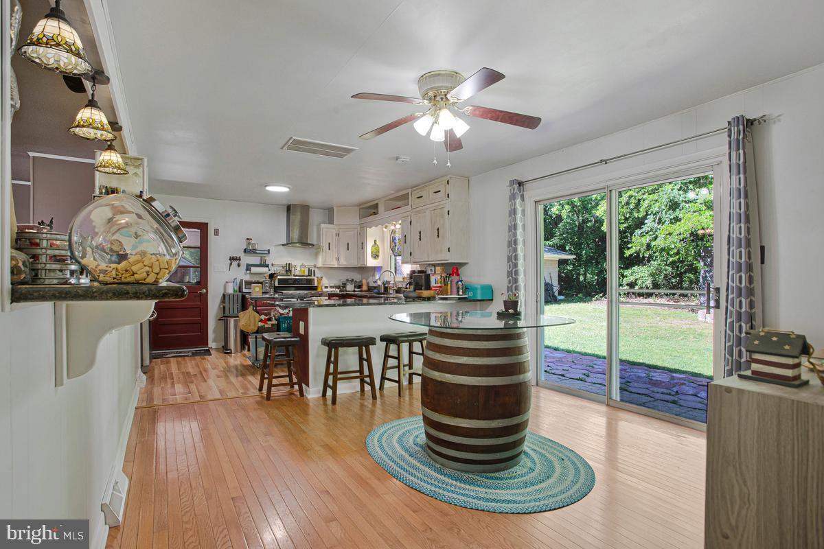 6600 Ashland Road La Plata, MD 20646 - Photo 11 of 40 a kitchen with a table and chairs