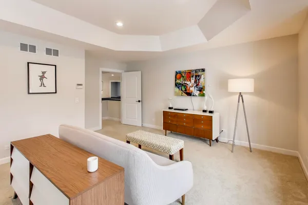 a bedroom with a bed and a cabinets