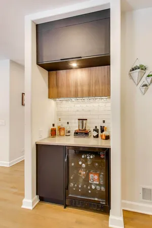 a kitchen with a cabinets and window