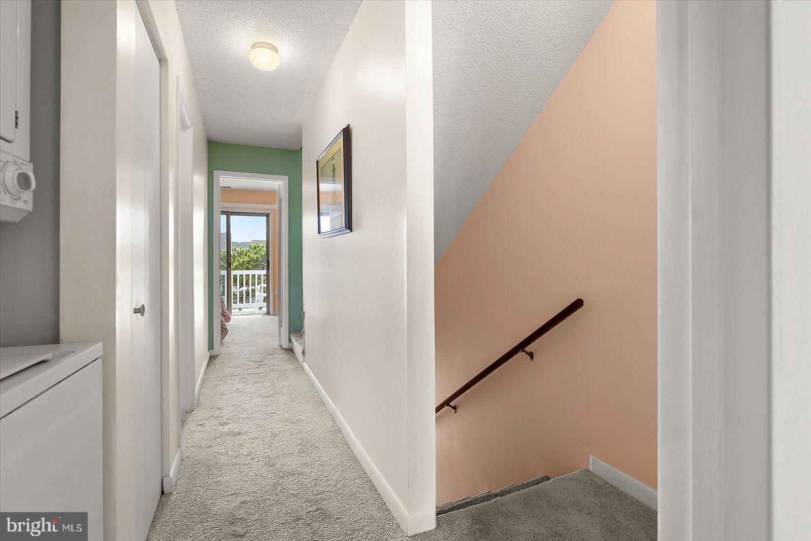 614 Osprey Road, Unit D Ocean City, MD 21842 - Photo 19 of 60 a view of a hallway with a hallway