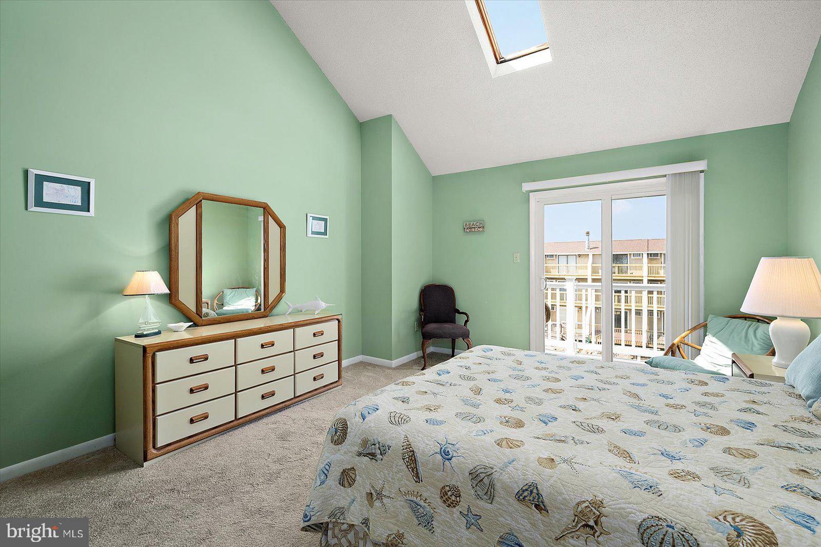 614 Osprey Road, Unit D Ocean City, MD 21842 - Photo 32 of 60 a bedroom with a bed and a dresser