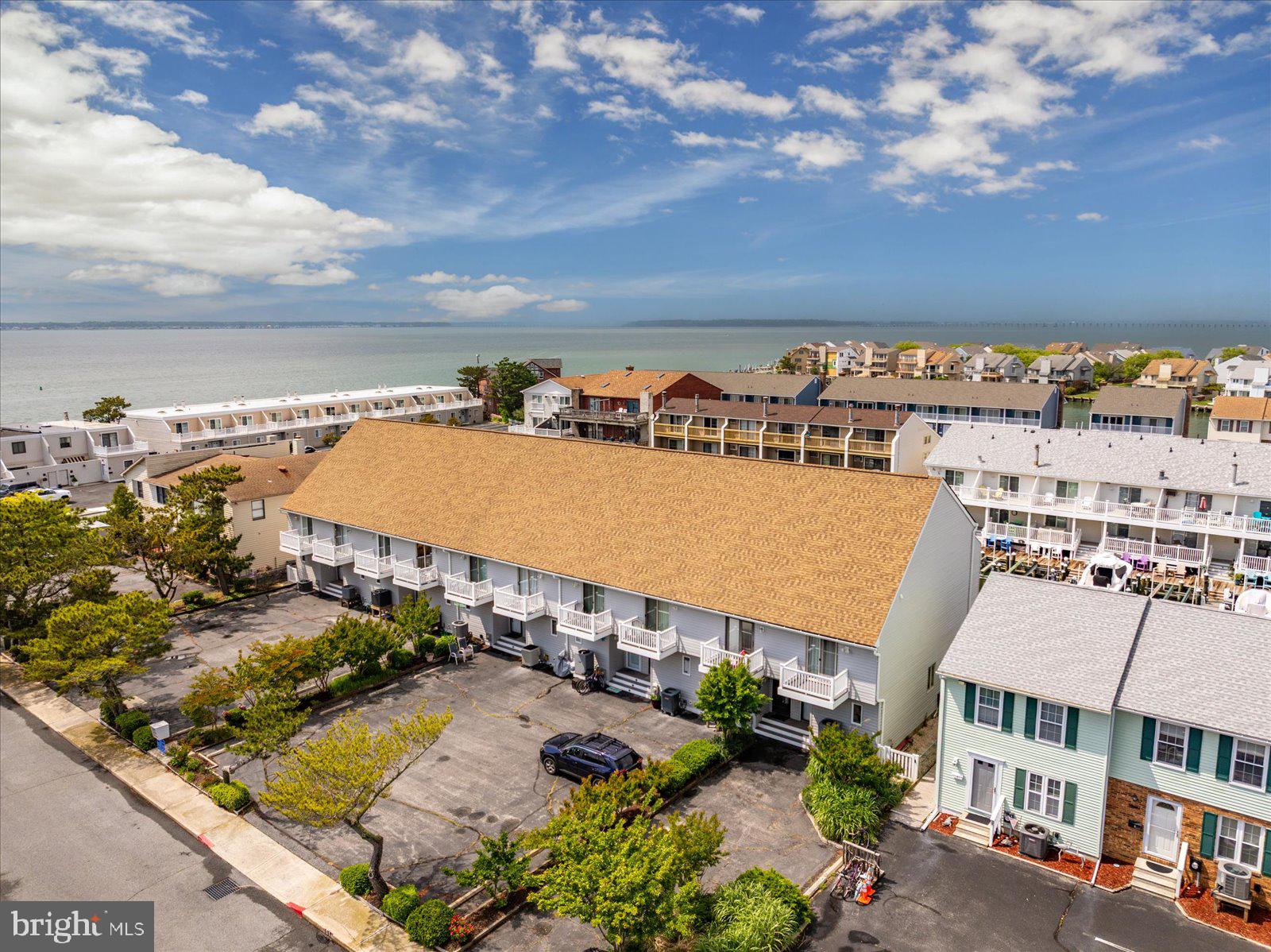 614 Osprey Road, Unit D Ocean City, MD 21842 - Photo 59 of 60 an aerial view of residential building and lake view