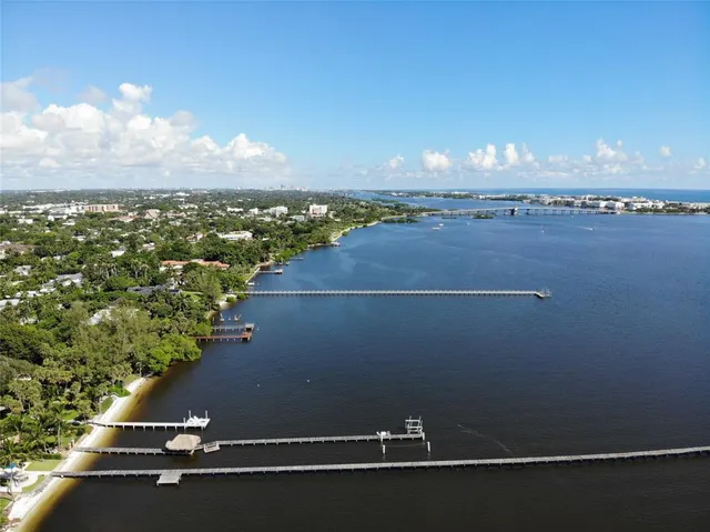 a view of a room with an empty space and a wooden floor