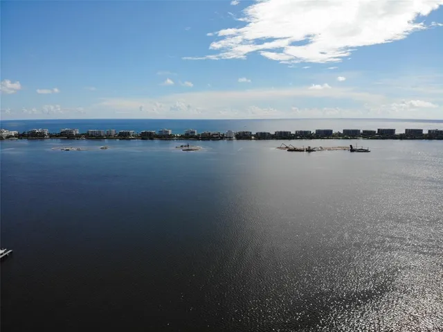 an aerial view of beach and ocean