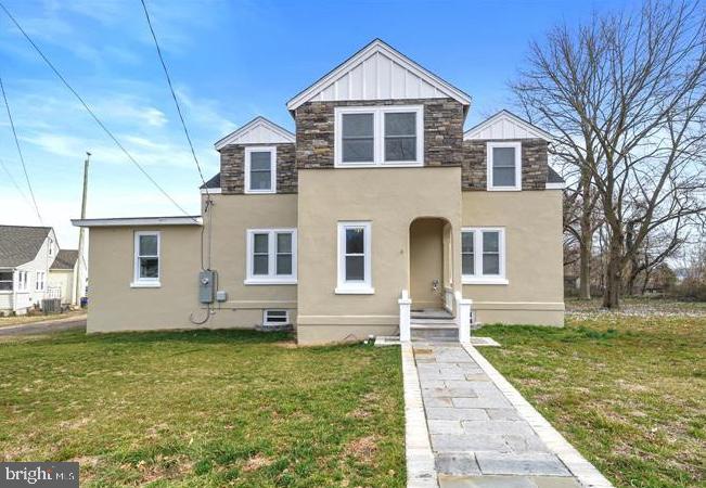 14161 Union Street Milton, DE 19968 - Photo 3 of 31 a front view of a house with garden