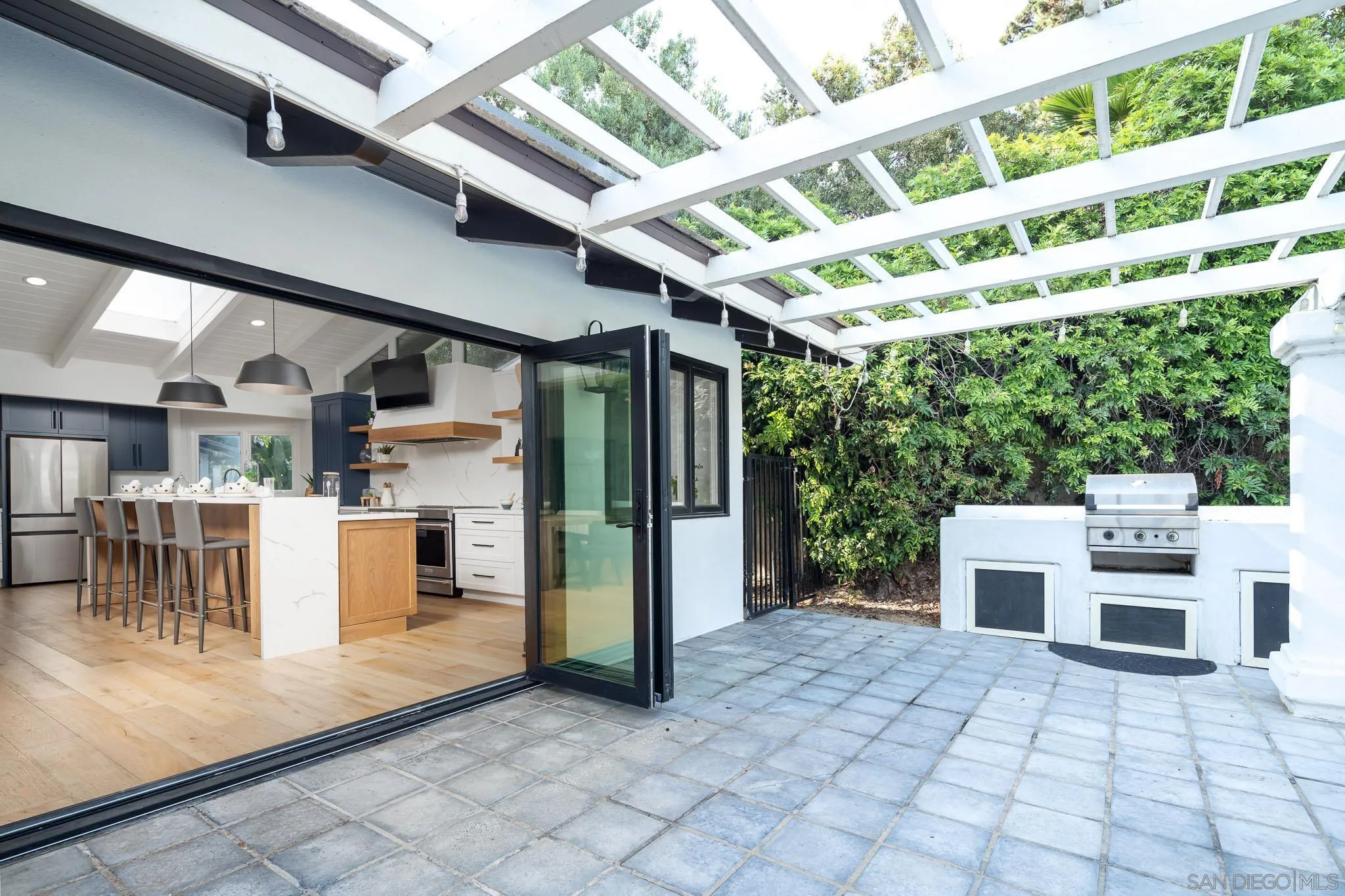 16610 Los Morros Rancho Santa Fe, CA 92067 - Photo 15 of 50 a view of a patio with a table and chairs