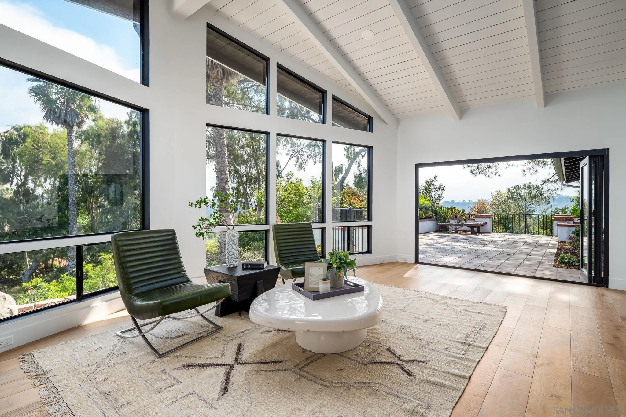 16610 Los Morros Rancho Santa Fe, CA 92067 - Photo 2 of 50 a living room with furniture and a large window