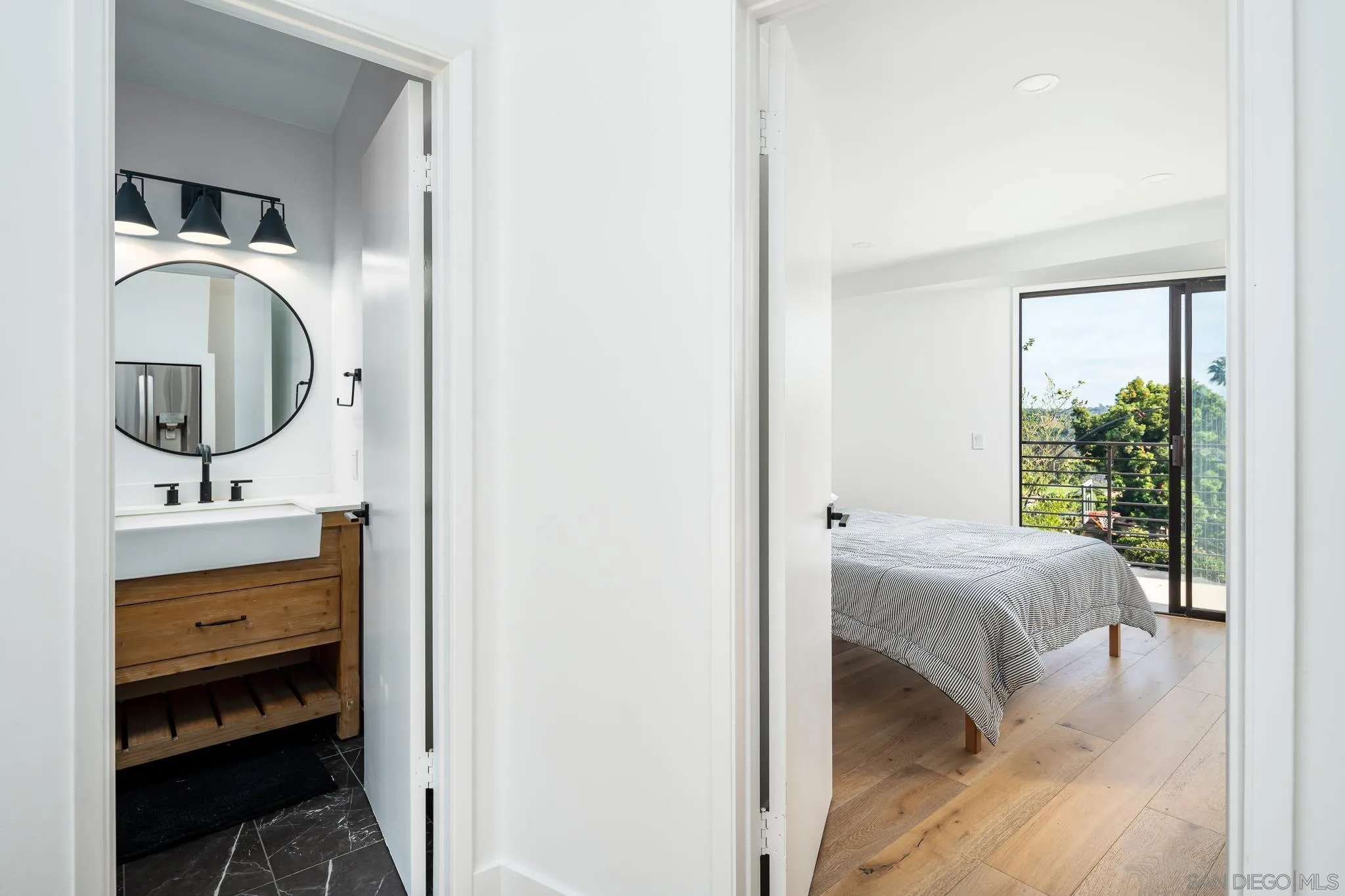 16610 Los Morros Rancho Santa Fe, CA 92067 - Photo 30 of 50 a en suite bathroom with a sink and a mirror