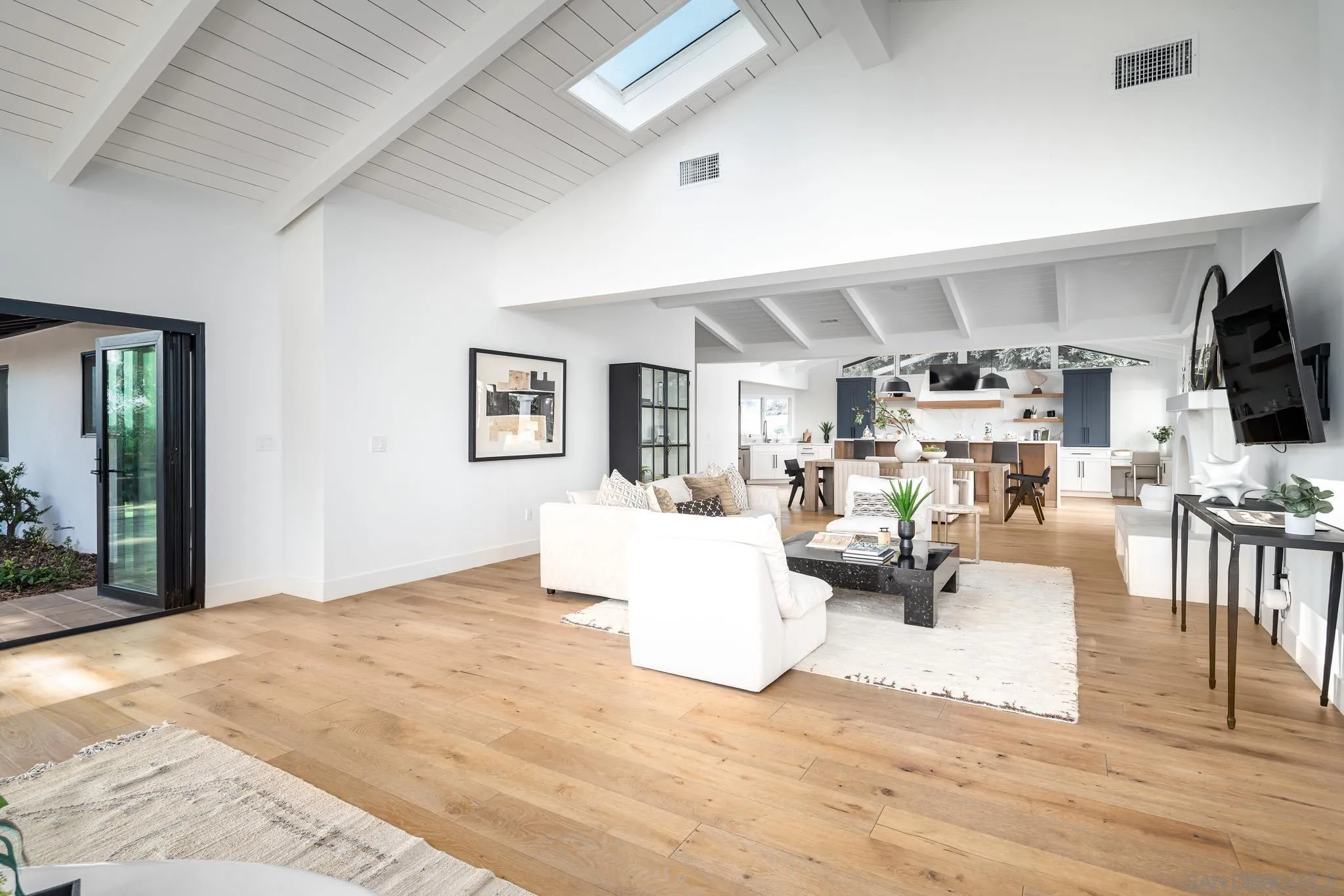 16610 Los Morros Rancho Santa Fe, CA 92067 - Photo 3 of 50 a living room with furniture and a flat screen tv