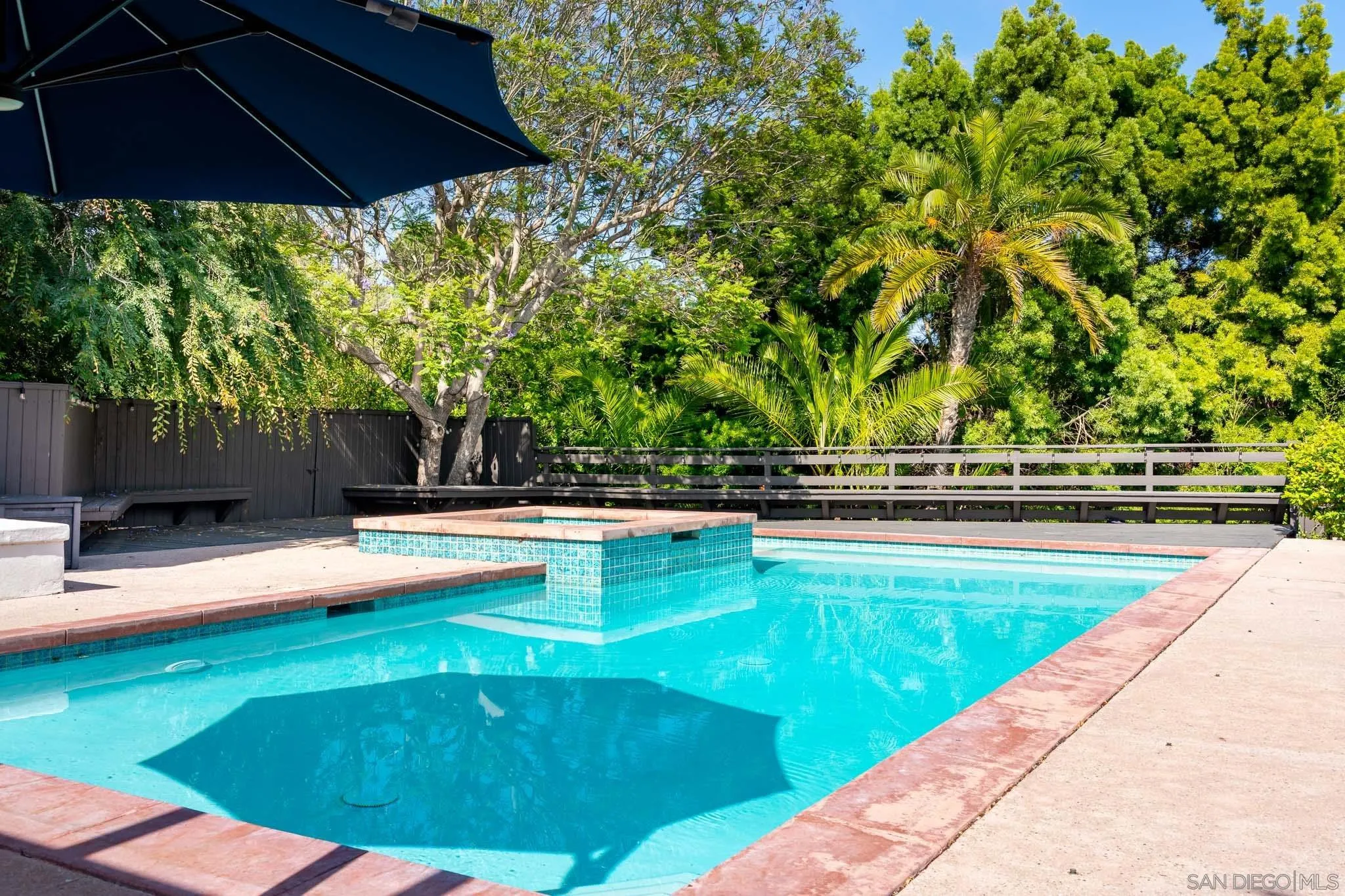 16610 Los Morros Rancho Santa Fe, CA 92067 - Photo 38 of 50 a view of a swimming pool with an outdoor seating