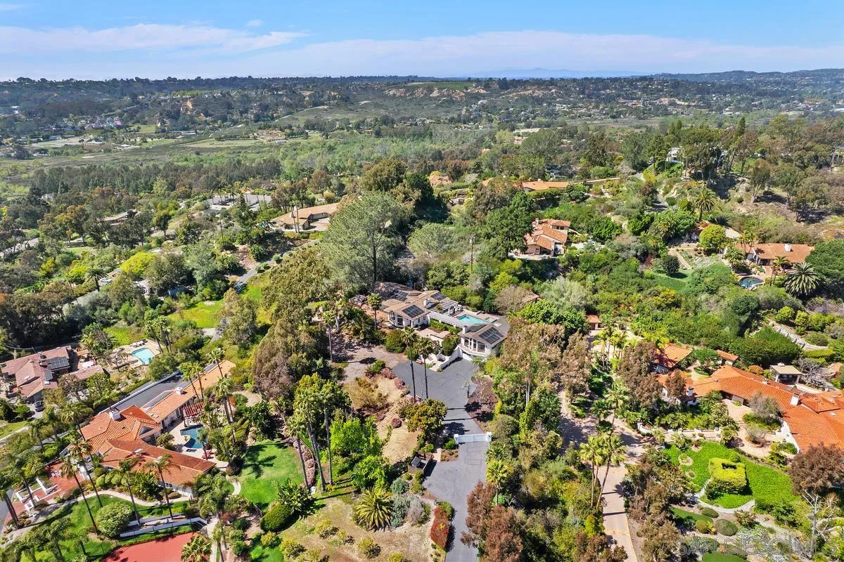 16610 Los Morros Rancho Santa Fe, CA 92067 - Photo 46 of 50 a view of a city with lush green forest