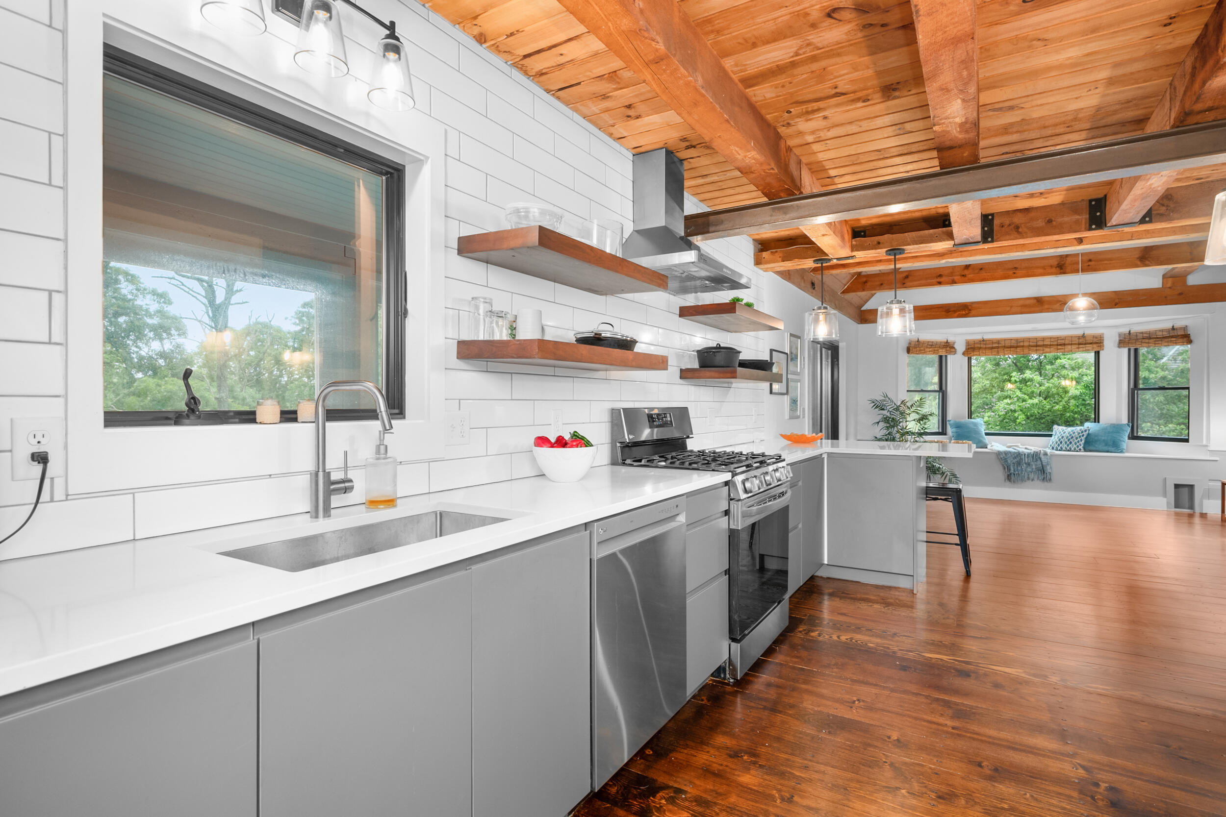 24 Chickadee Circle Chatham, MA 02633 - Photo 11 of 44 a kitchen with sink cabinets and wooden floor