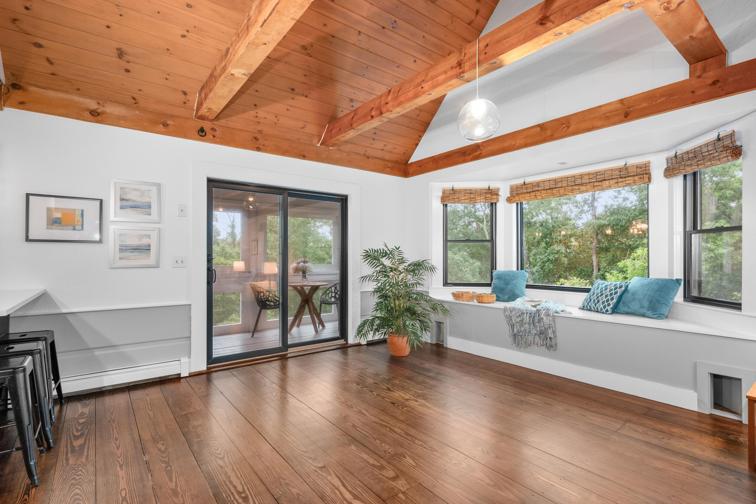 24 Chickadee Circle Chatham, MA 02633 - Photo 29 of 44 a living room with furniture and large windows