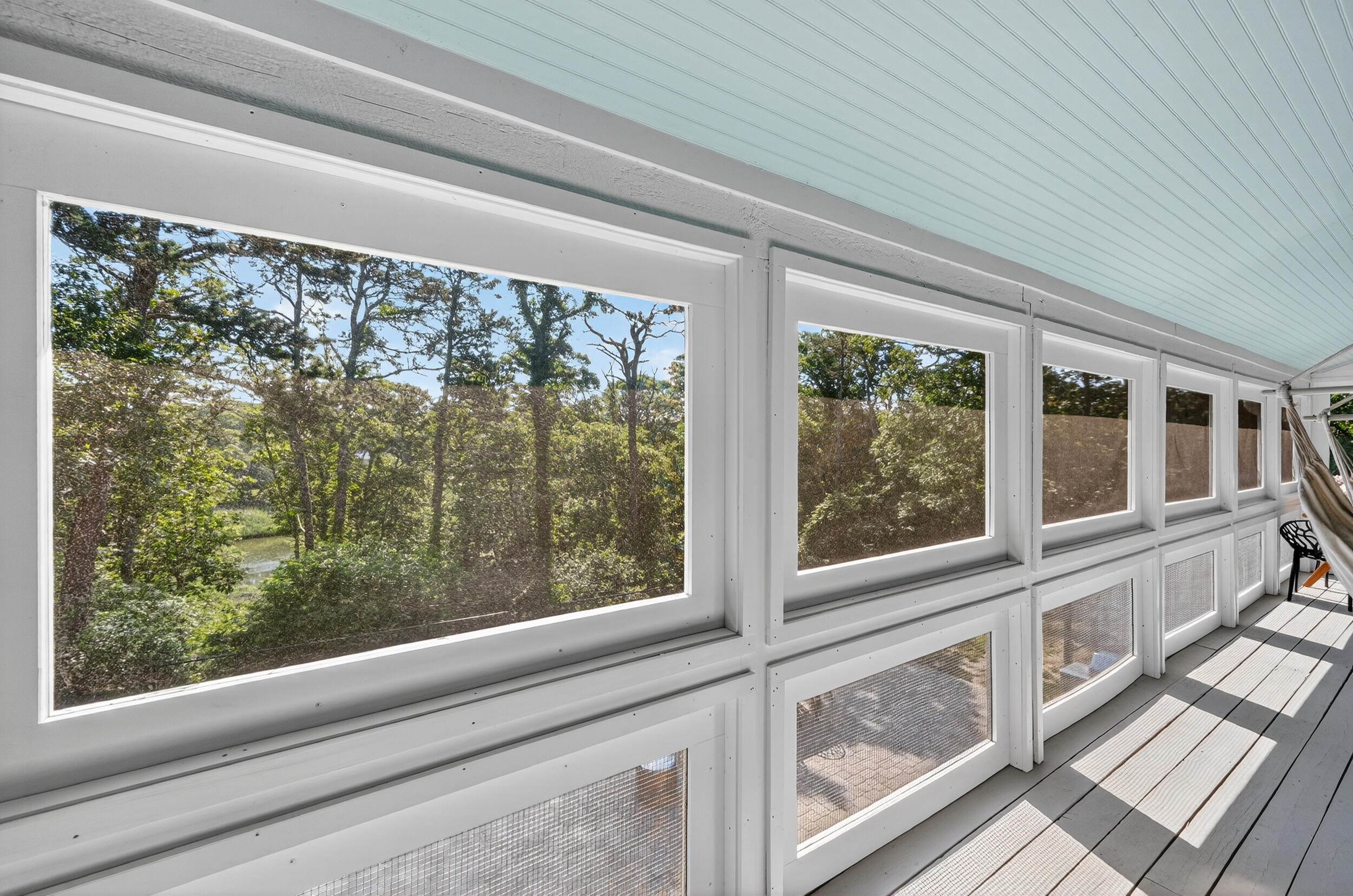 24 Chickadee Circle Chatham, MA 02633 - Photo 31 of 44 a view of a house with a large window and front door