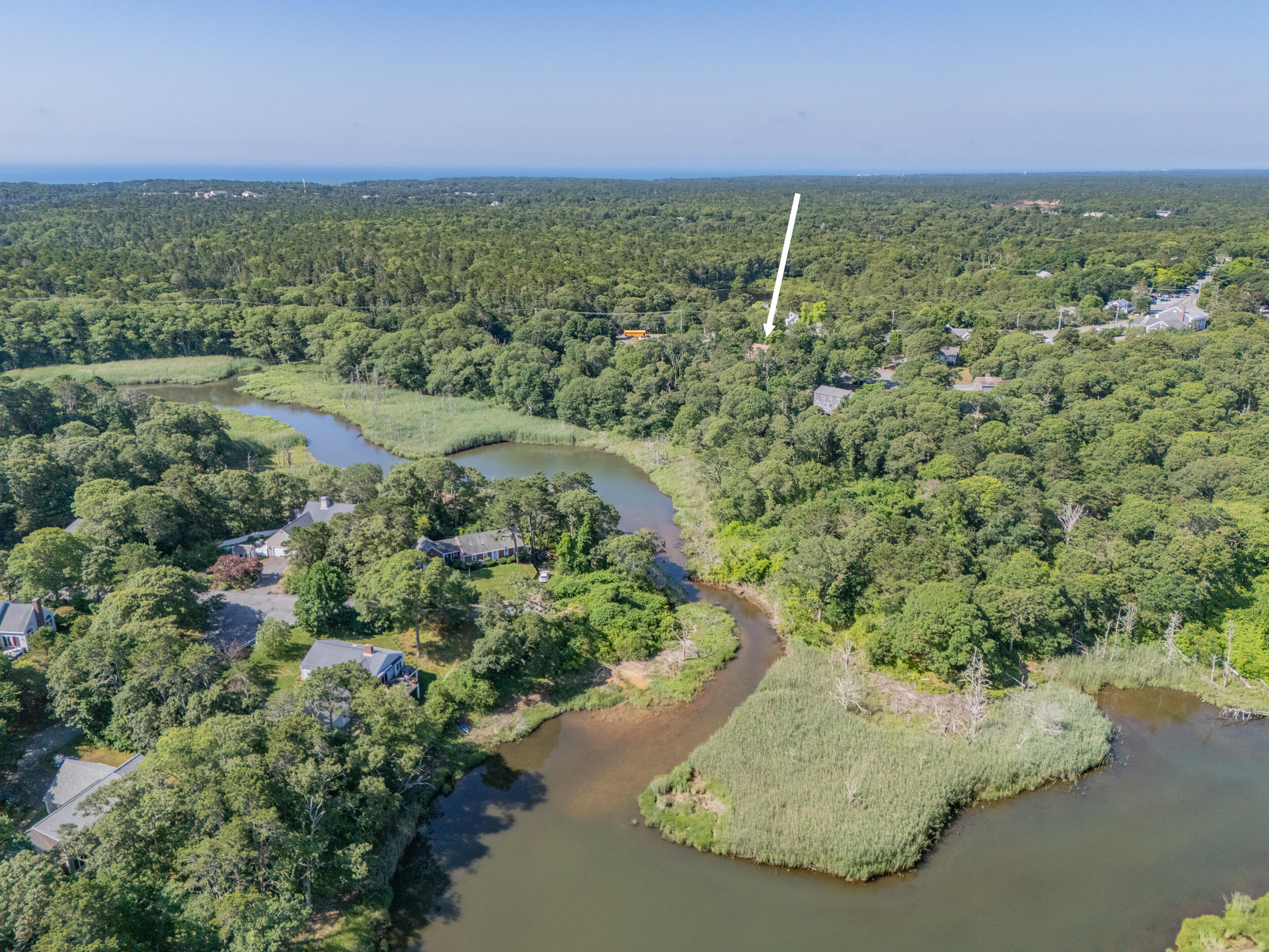 24 Chickadee Circle Chatham, MA 02633 - Photo 39 of 44 an aerial view of a house with a yard and lake view