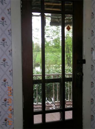122 Pond Brook Road Huntington, MA 01050 - Photo 11 of 19 a view of a glass door with a yard from a room