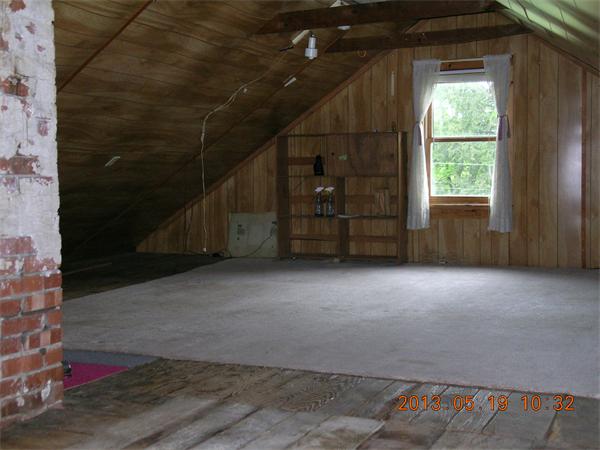 122 Pond Brook Road Huntington, MA 01050 - Photo 16 of 19 a view of a livingroom with an empty space and a window