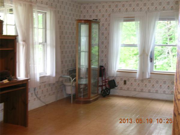122 Pond Brook Road Huntington, MA 01050 - Photo 10 of 19 a living room with furniture and a flat screen tv