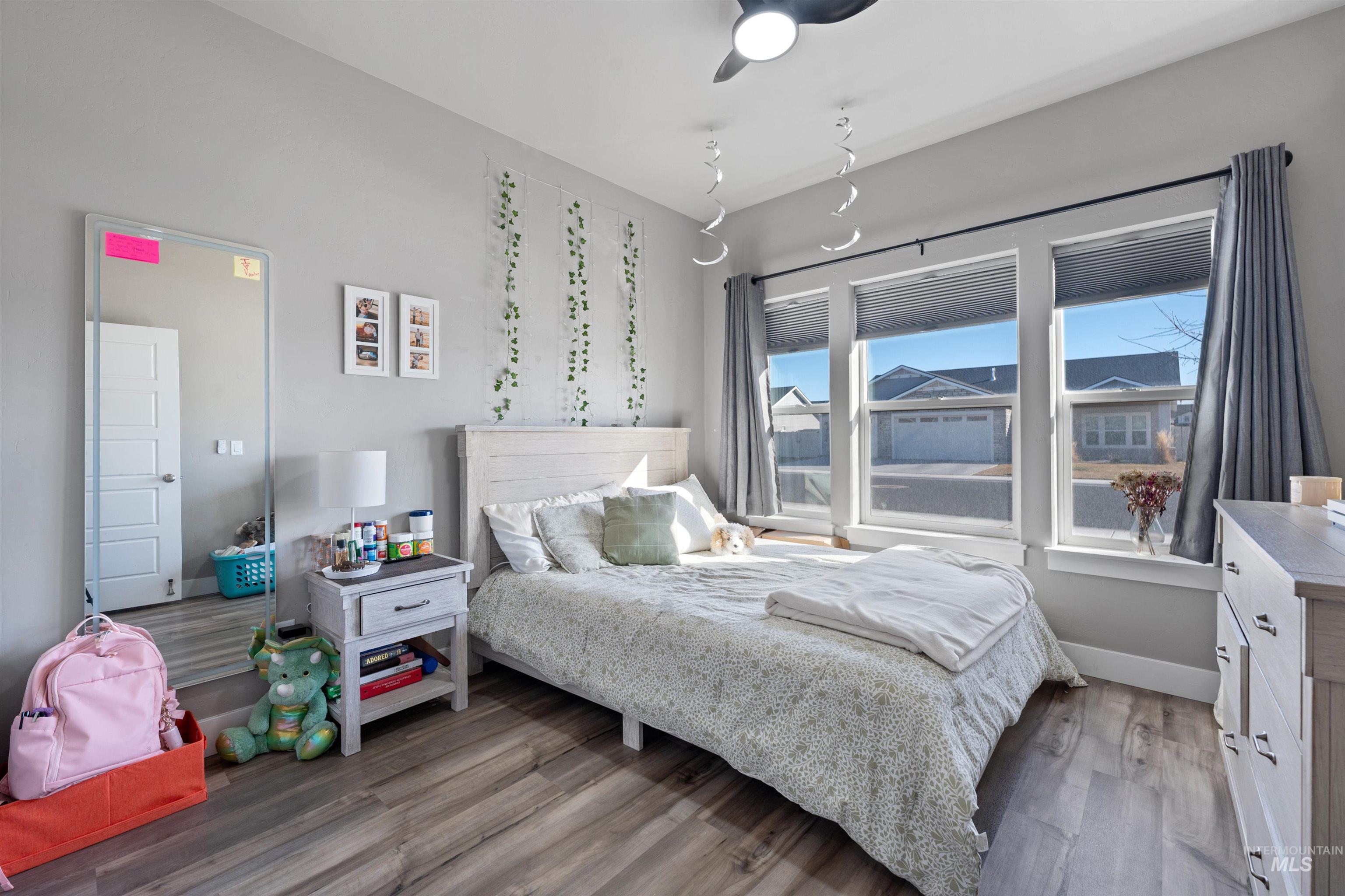 1005 Kenbrook Loop Twin Falls, ID 83301 - Photo 23 of 47 Bedroom with wood finished floors and ceiling fan