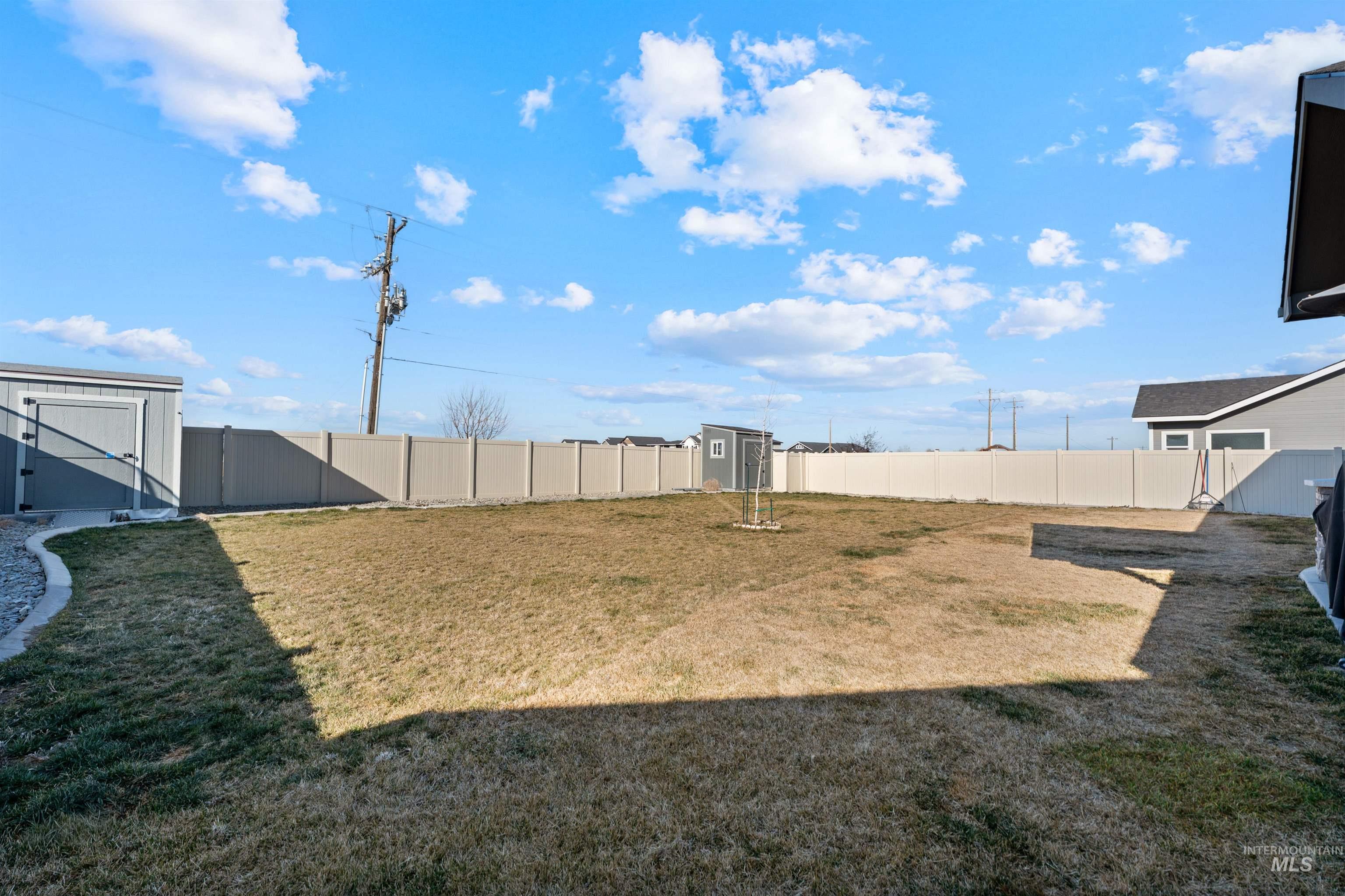 1005 Kenbrook Loop Twin Falls, ID 83301 - Photo 37 of 47 Fenced backyard featuring a storage shed