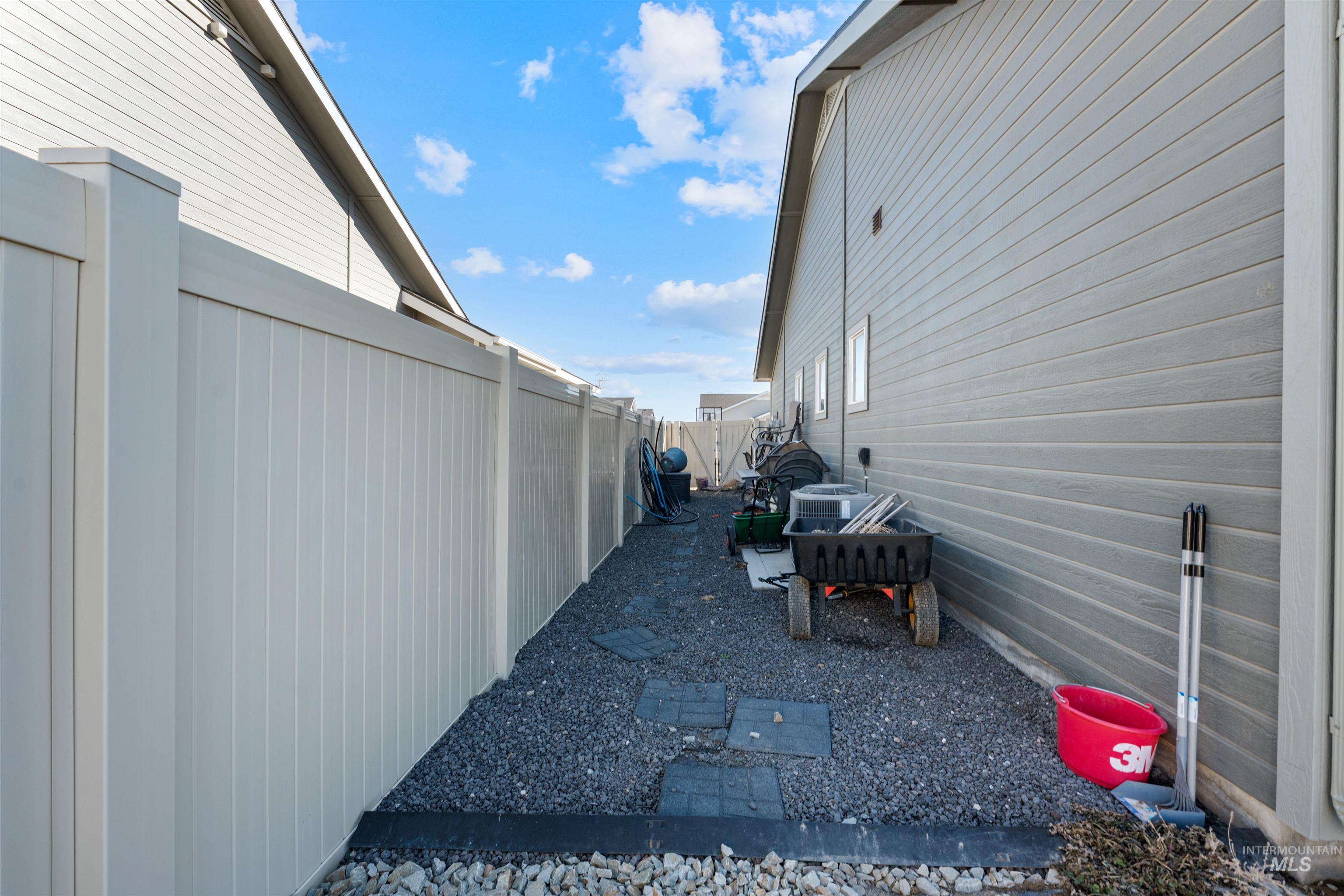 1005 Kenbrook Loop Twin Falls, ID 83301 - Photo 41 of 47 View of side of home with a fenced backyard