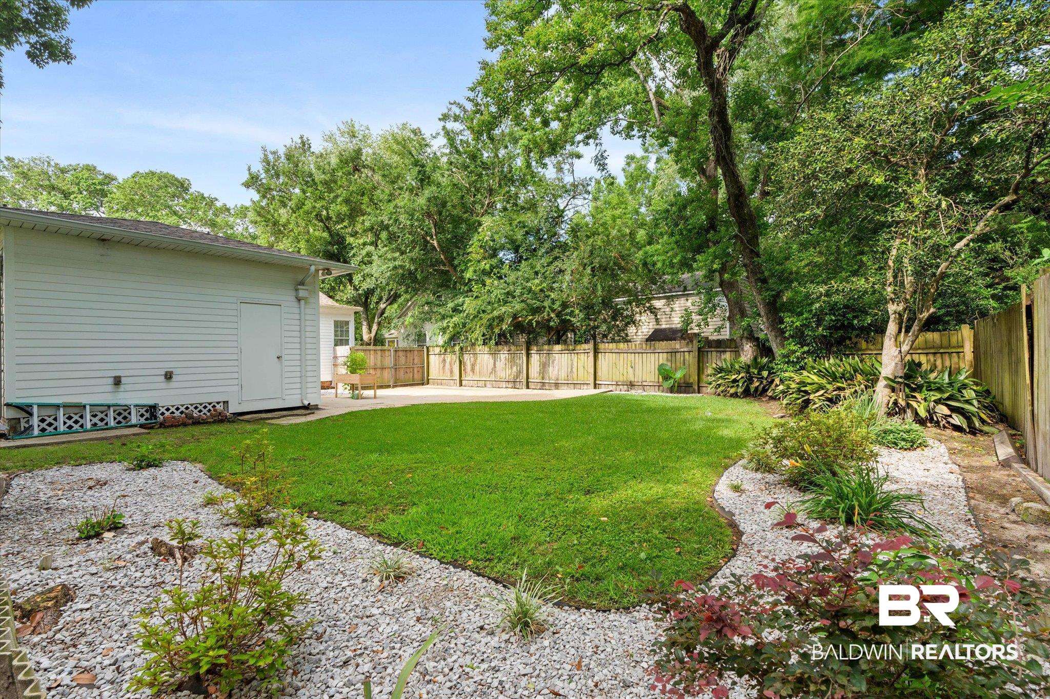 1910 Hunter Avenue Mobile, AL 36606 - Photo 20 of 21 View of yard featuring a patio area