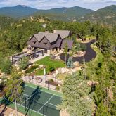 an aerial view of a house with a garden