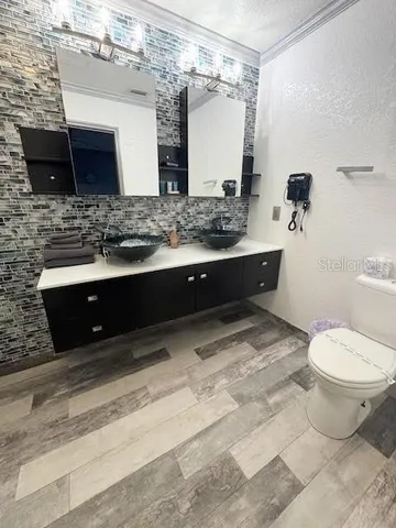a bathroom with a sink and a toilet