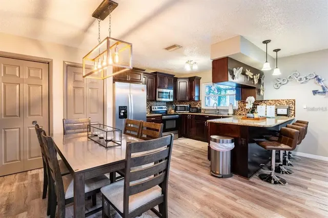 a view of a dining room with furniture