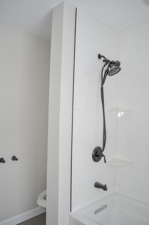 25 Eton Street Springfield, MA 01108 - Photo 16 of 31 a bathroom with a shower