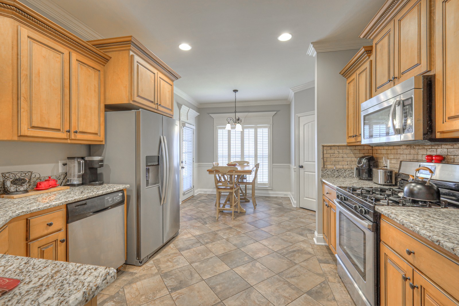 2017 Stonebrook Circle Mount Juliet, TN 37122 - Photo 15 of 39 a kitchen with stainless steel appliances granite countertop a refrigerator and a stove top oven