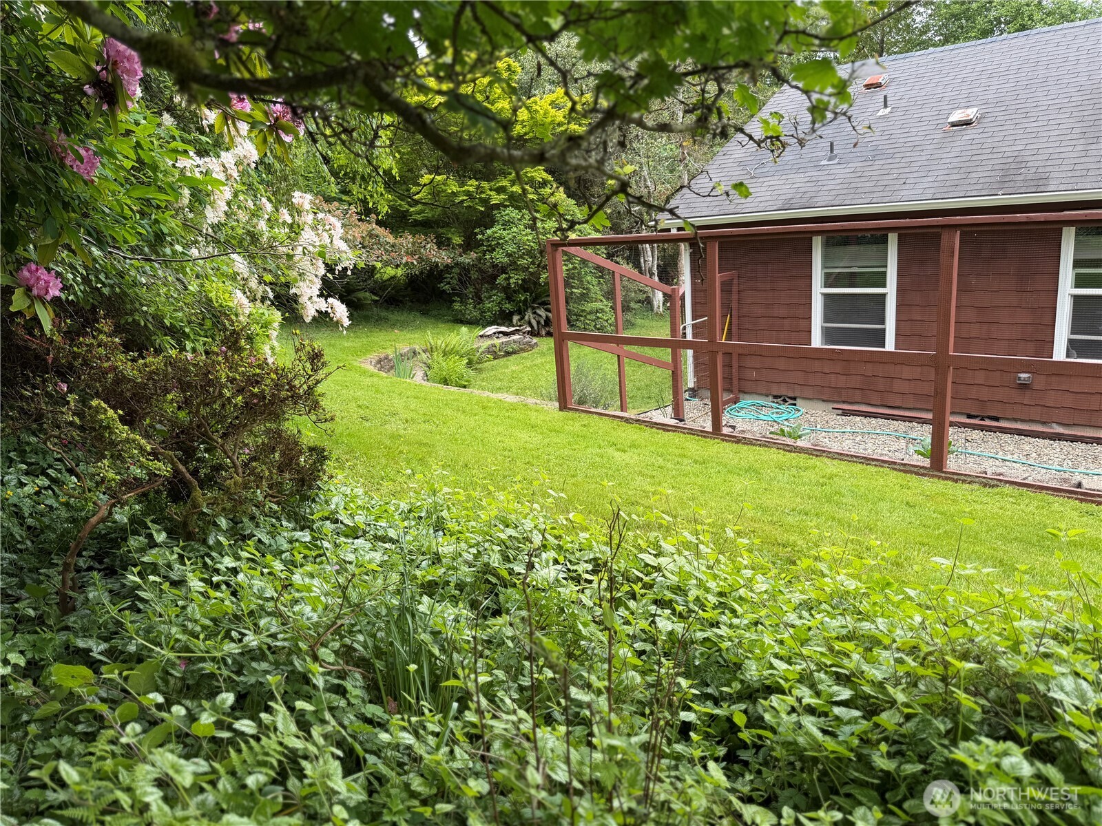 1171 Ray Hicks Street Raymond, WA 98577 - Photo 25 of 33 a view of a house with a yard
