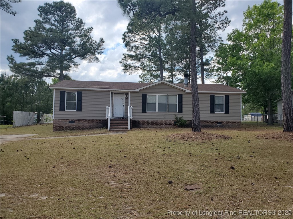 a house with trees in the background