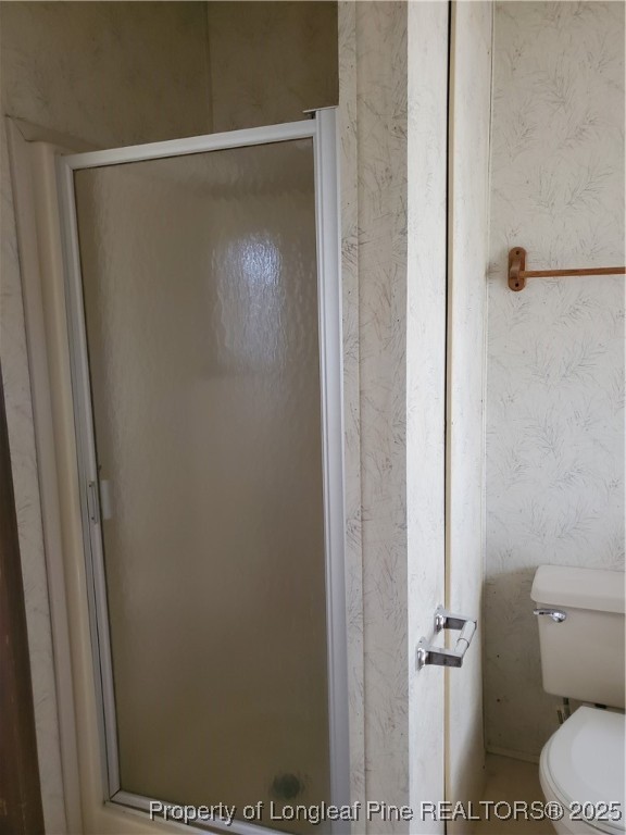 50 Old Forte Trail Spring Lake, NC 28390 - Photo 15 of 20 a bathroom with a shower and a toilet