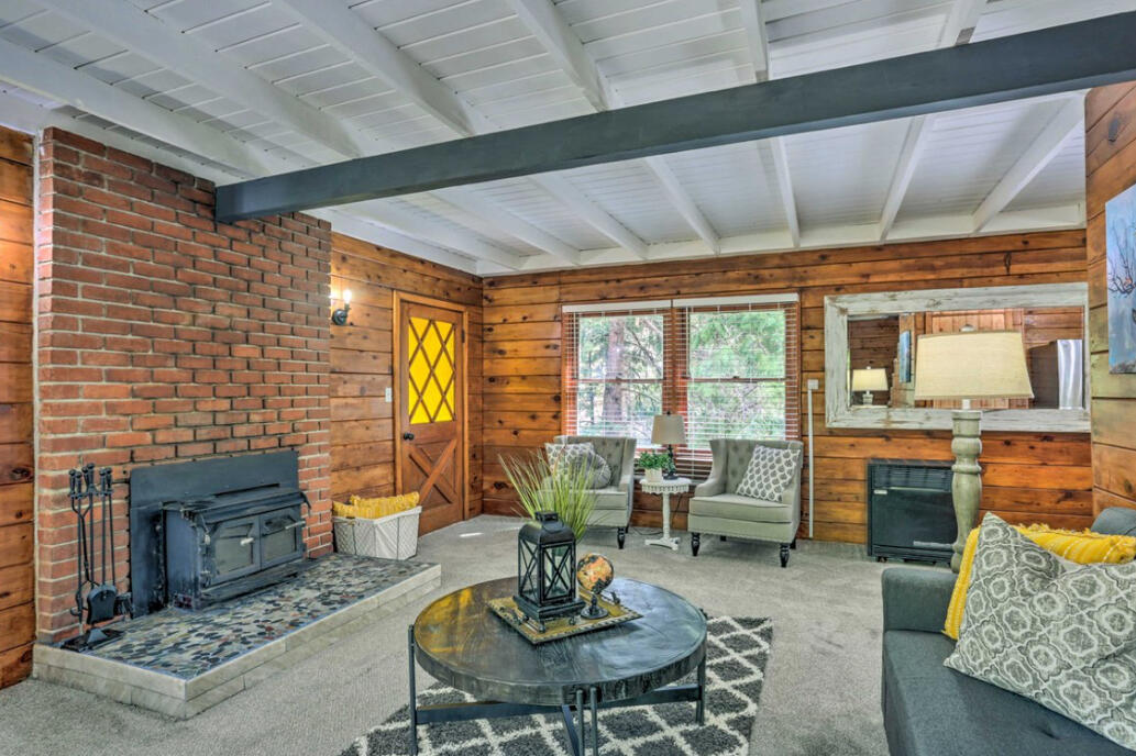 42036 Tollhouse Road Shaver Lake, CA 93664 - Photo 11 of 30 a living room with furniture and a fireplace
