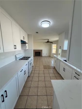 a large kitchen with cabinets