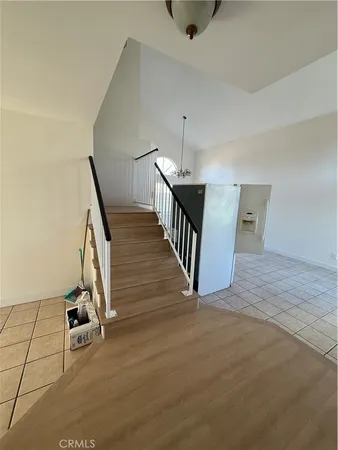 a view of a hallway with stairs