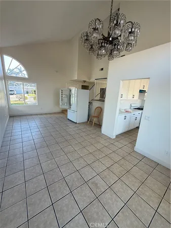 a view of a storage & utility room with a window