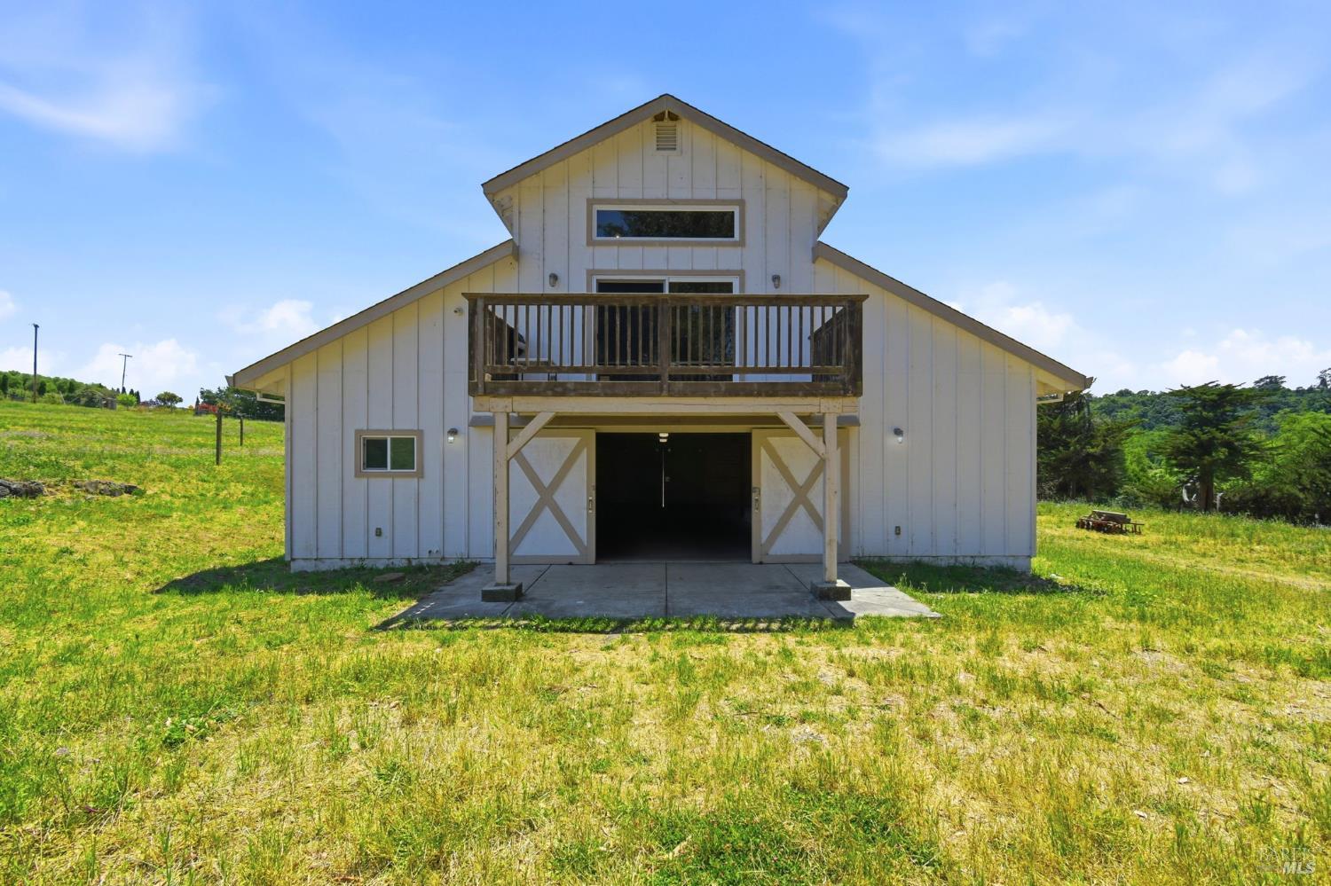 3223 Canfield Road Sebastopol, CA 95472 - Photo 47 of 58 Front View of Barn with Apartment and Balcony Above
