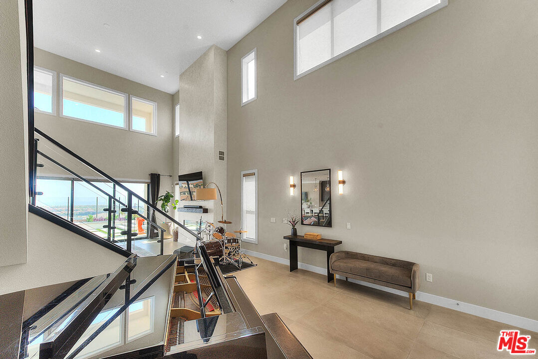 20558 Overlook Court Porter Ranch, CA 91326 - Photo 2 of 48 a view of game room with windows