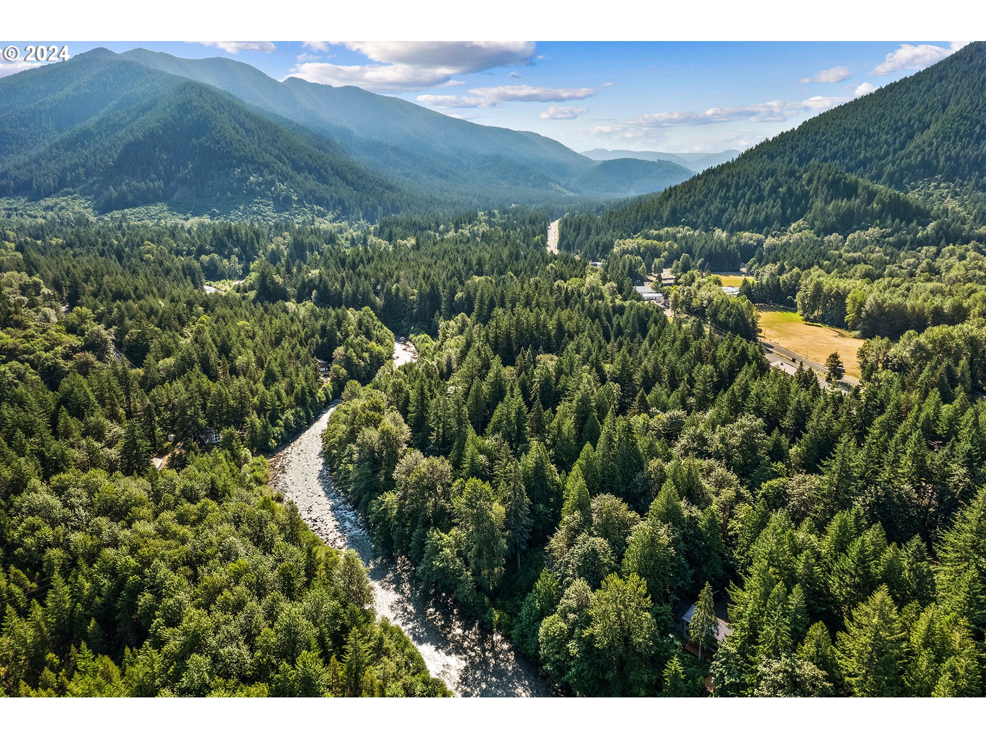 East Vine Maple Drive Rhododendron, OR 97049 - Photo 14 of 18 a view of a city with green field