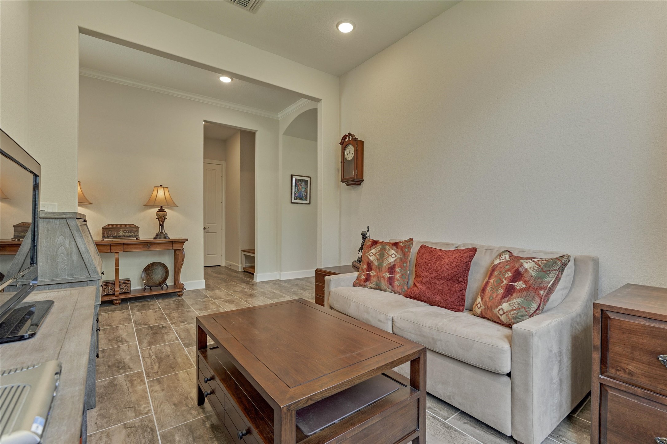 132 Chestnut Bay Spring, TX 77382 - Photo 11 of 33 a living room with furniture and a flat screen tv