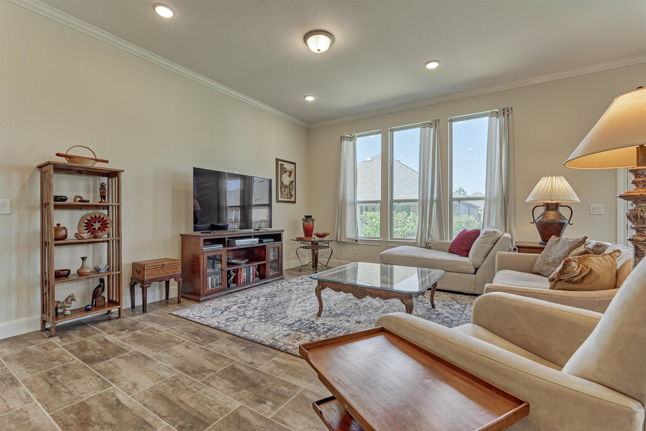 132 Chestnut Bay Spring, TX 77382 - Photo 14 of 33 a living room with furniture and a flat screen tv