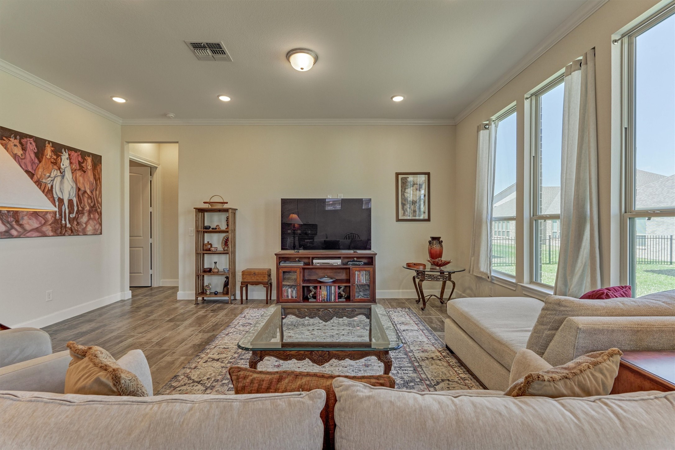 132 Chestnut Bay Spring, TX 77382 - Photo 15 of 33 a living room with furniture and a flat screen tv