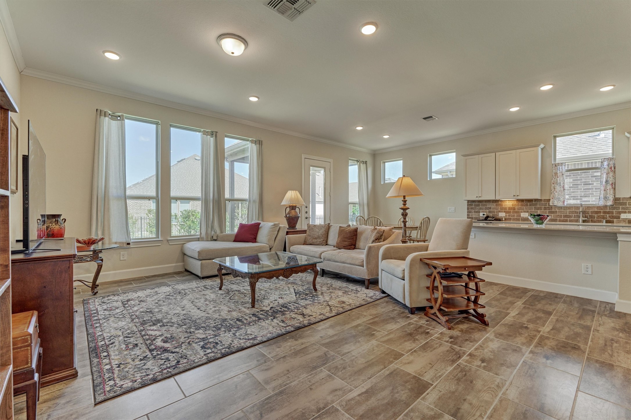 132 Chestnut Bay Spring, TX 77382 - Photo 16 of 33 a living room with furniture and floor to ceiling window