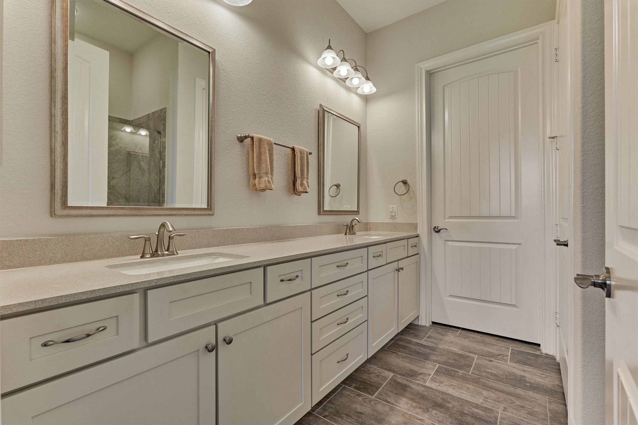 132 Chestnut Bay Spring, TX 77382 - Photo 26 of 33 a bathroom with a double vanity sink and mirror